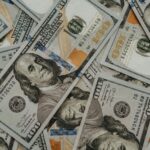 Sri Lanka bond yields open down, rupee weaker