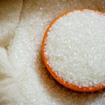 Indian sugar mills rush export deals on record-low rupee, rising global prices